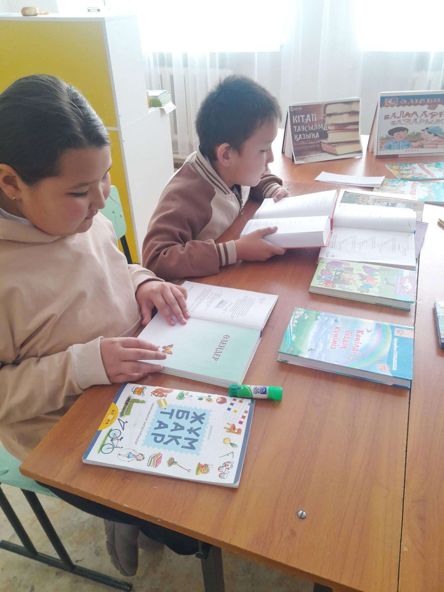 Каникулда кітап оқимыз